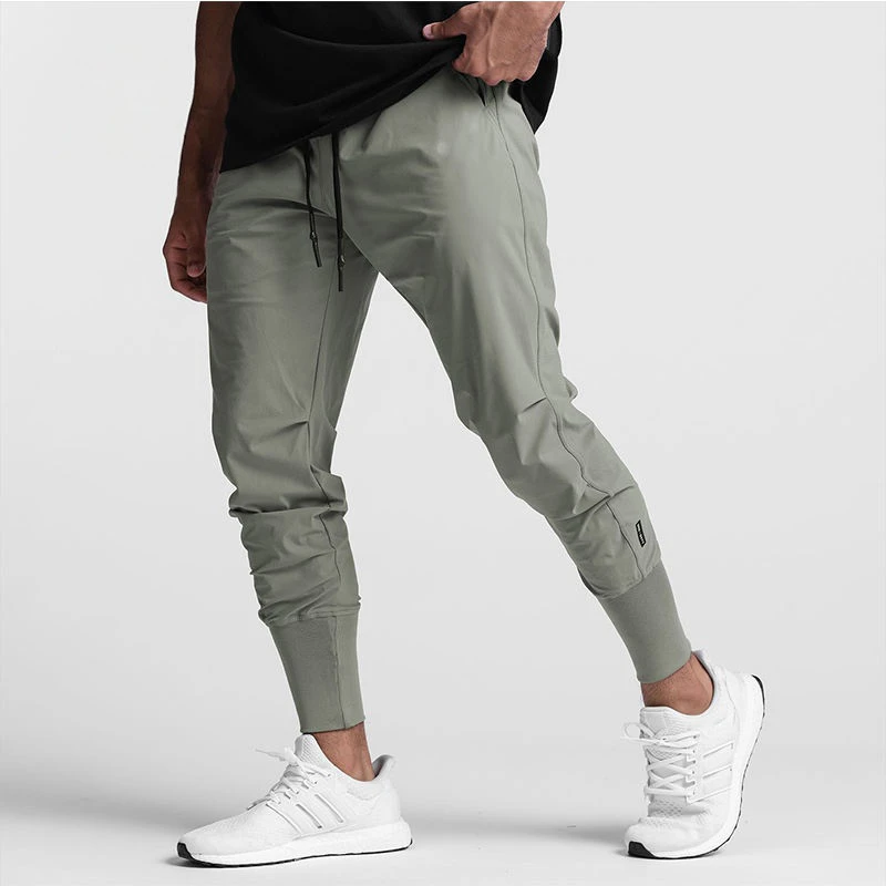 Joggers de poliéster slim fit para hombre · 2