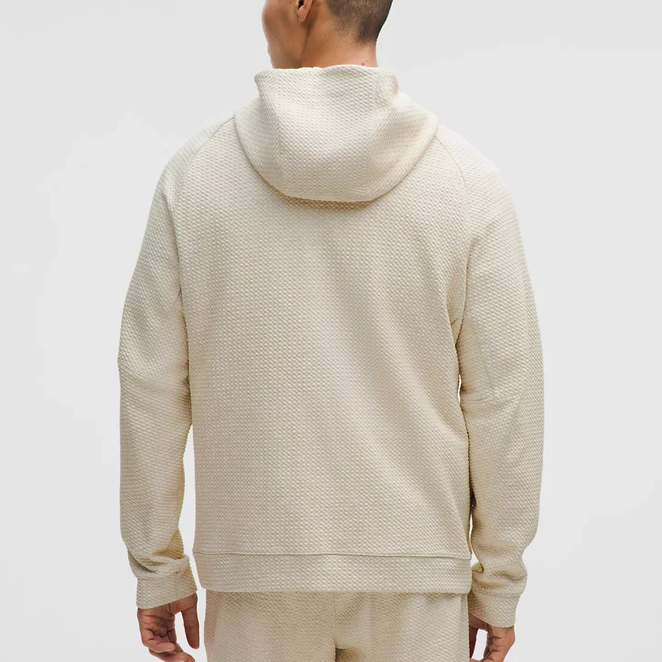 Back of a catalogue hoodie showing hood, seams and fit details